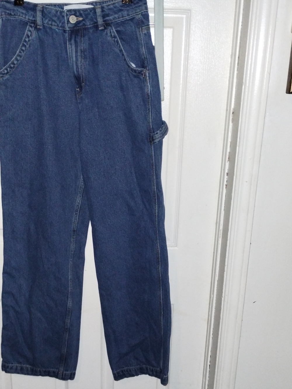 Refuge blue denim carpenter jeans featuring a relaxed straight-leg.Size 1